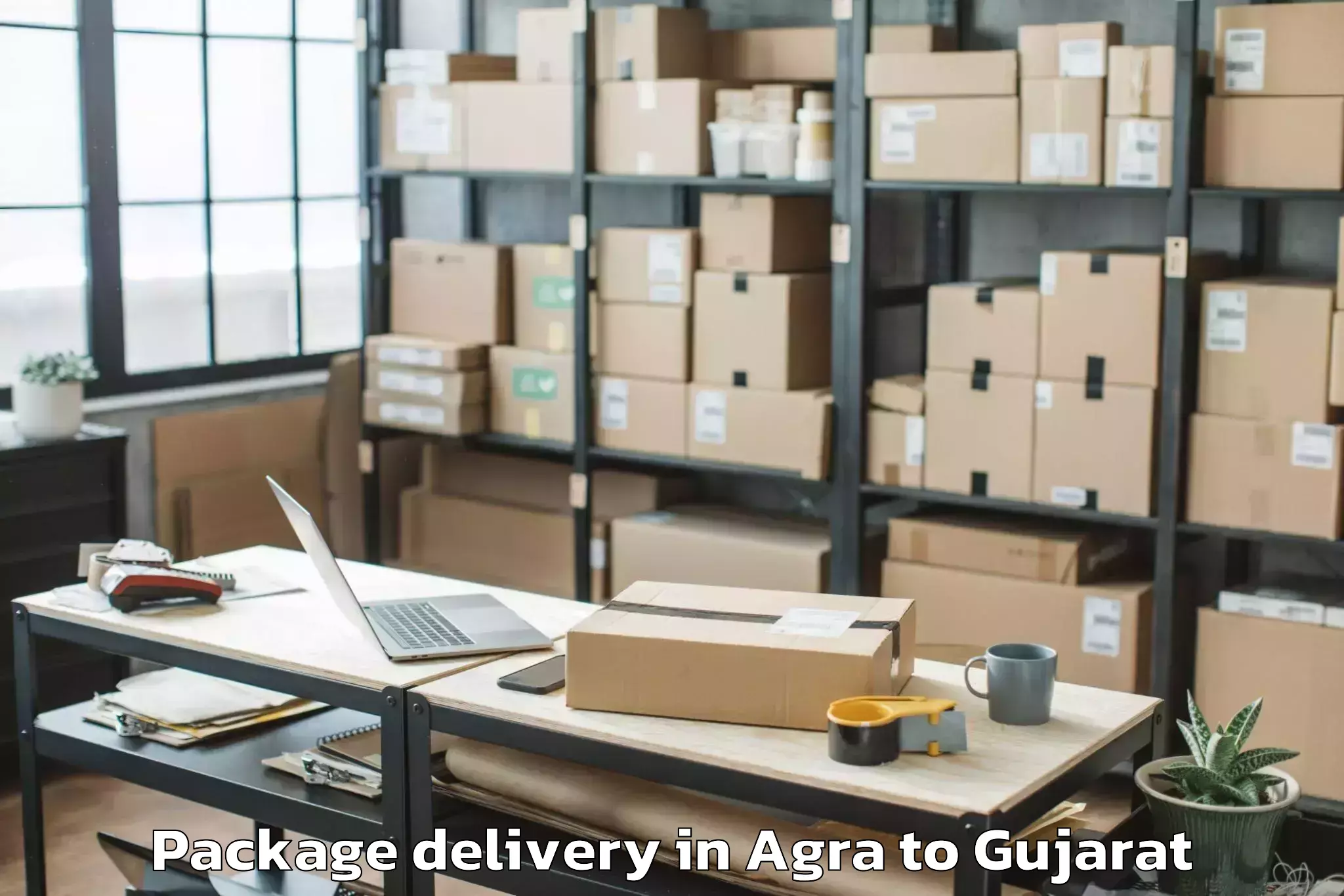 Easy Agra to Karjan Package Delivery Booking